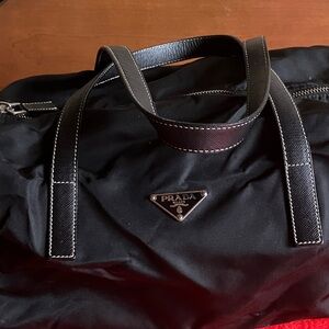 Authentic. Prada Black Duffel Bag for women .